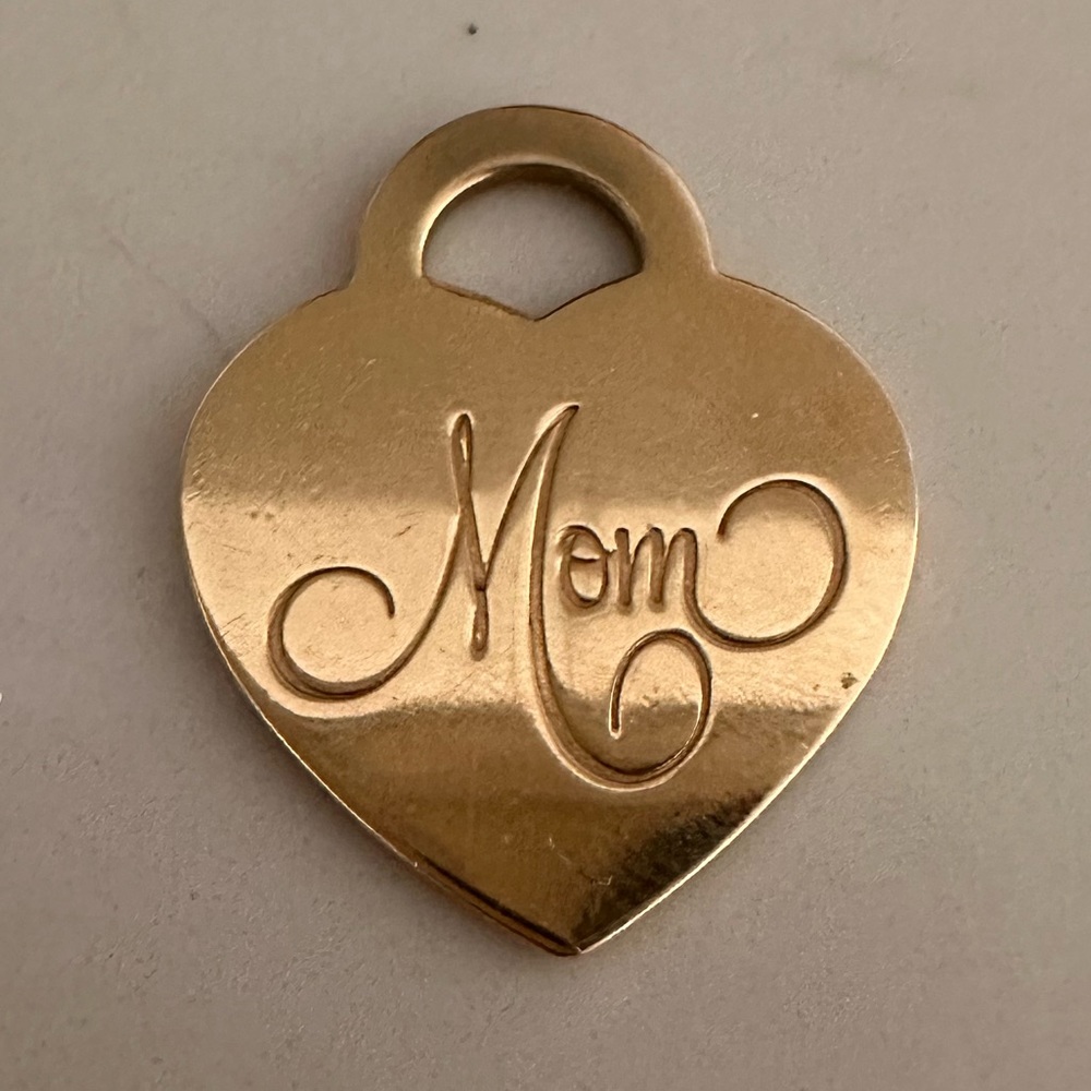 Auth Tiffany yellow gold Heart pendant 1inch tall 0.75 inches wide